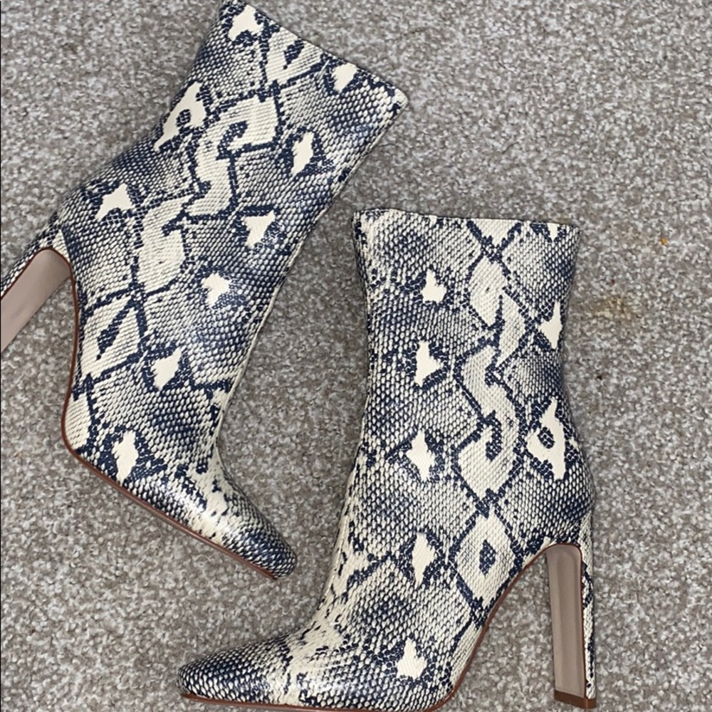 Beige snake print flat heel ankle boot